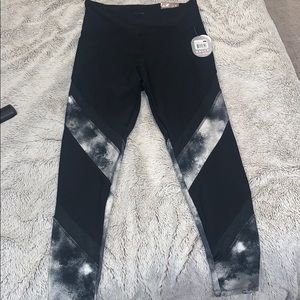Black workout leggings with Galaxy design.